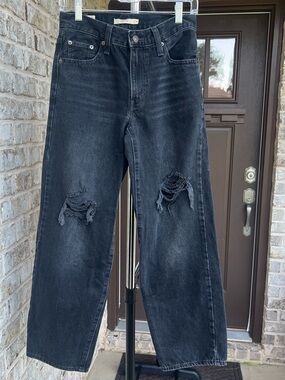 Black Levi’s Baggy Dad Jean size 24x30 with destruction.